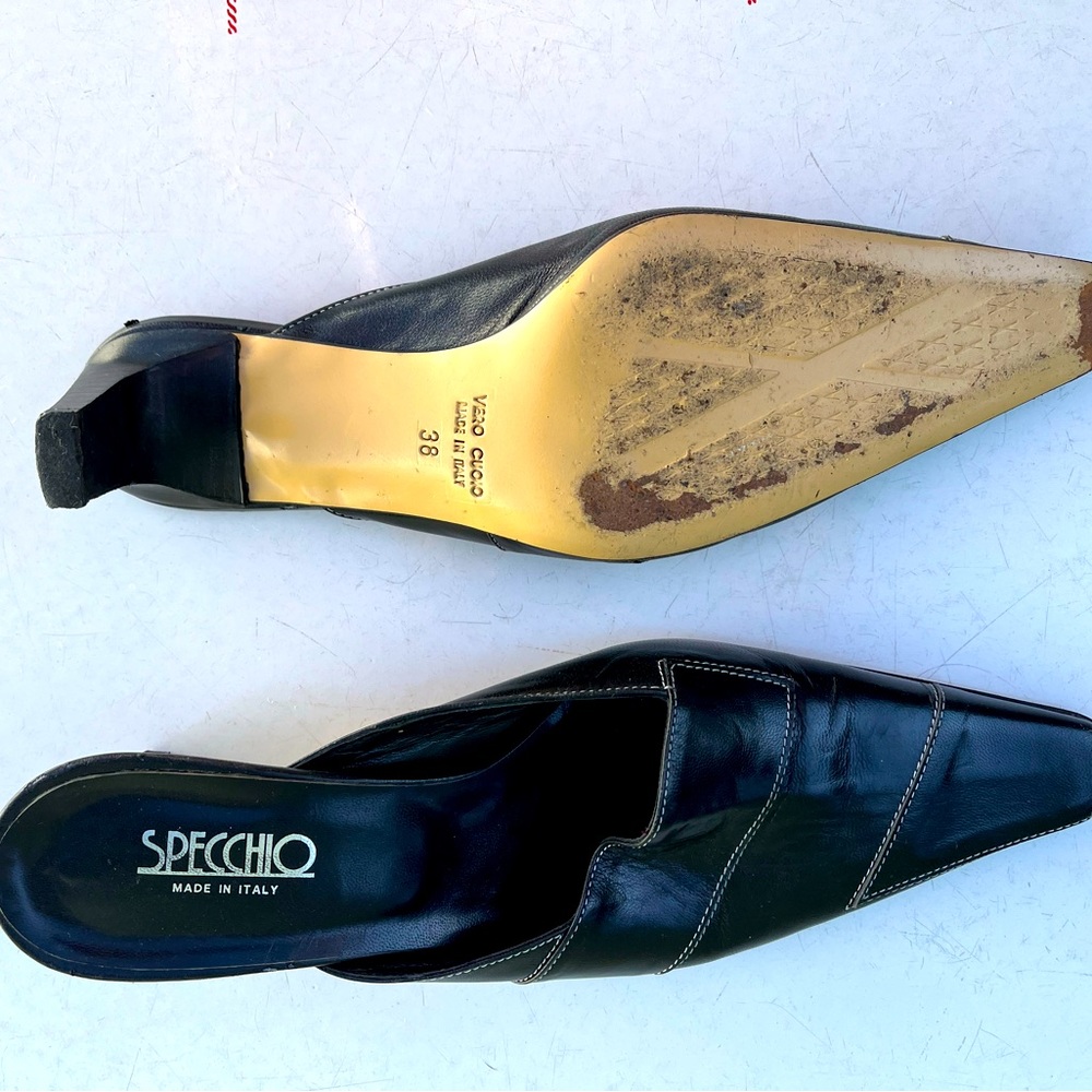Barely worn mules from this rare Italian brand. Black mid-heel. Great condition!